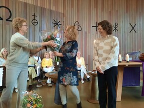 Bloemen voor leiding KND