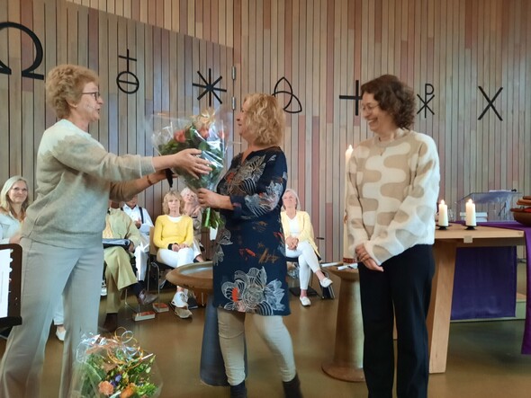 Bloemen voor leiding KND